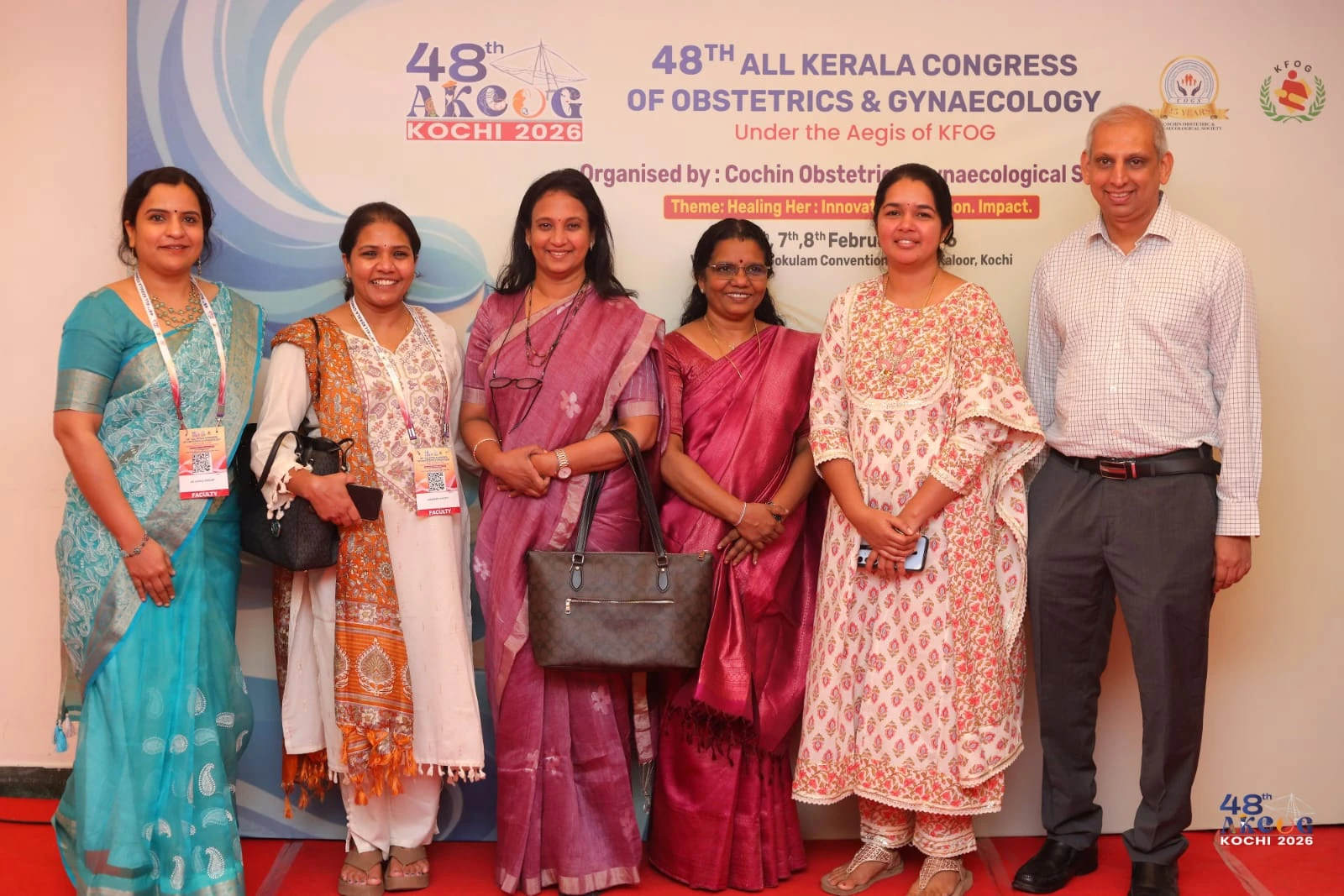 Dr. Anjana J S with faculty at AKCOG Congress